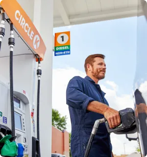 Man fueling vehicle at Circle K
