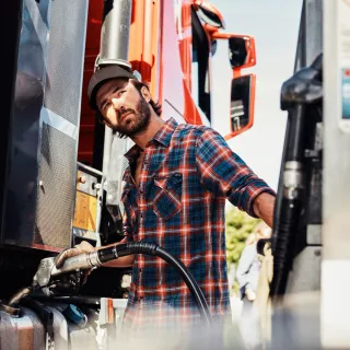 Man fueling his truck