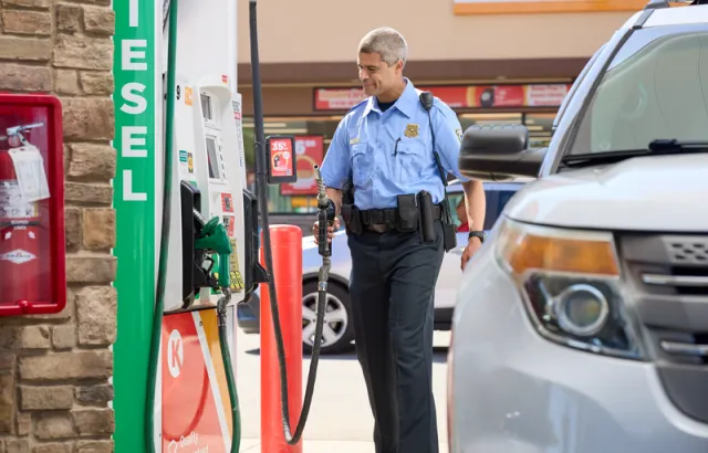 Circle K Police Officer Pumping Gas