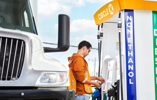 Man fueling his truck at a Circle K station