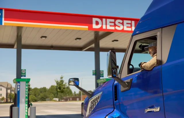 Truck driver outside Circle K station