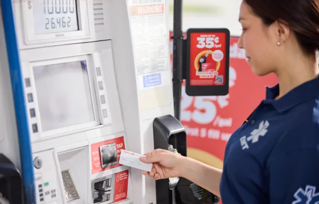 Paramedic pumping gas